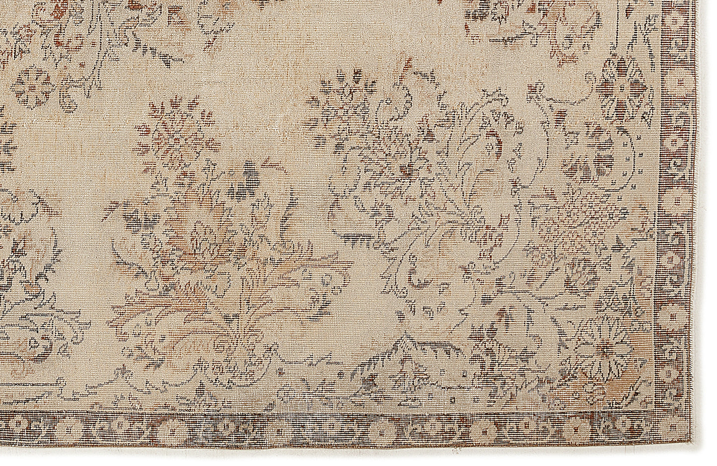 The Tefaas Vintage Floral Rug (6'8” x 9'7”) features a light beige background with intricate brown and blue floral and vine motifs, complemented by a narrow decorative border for an antique look.
