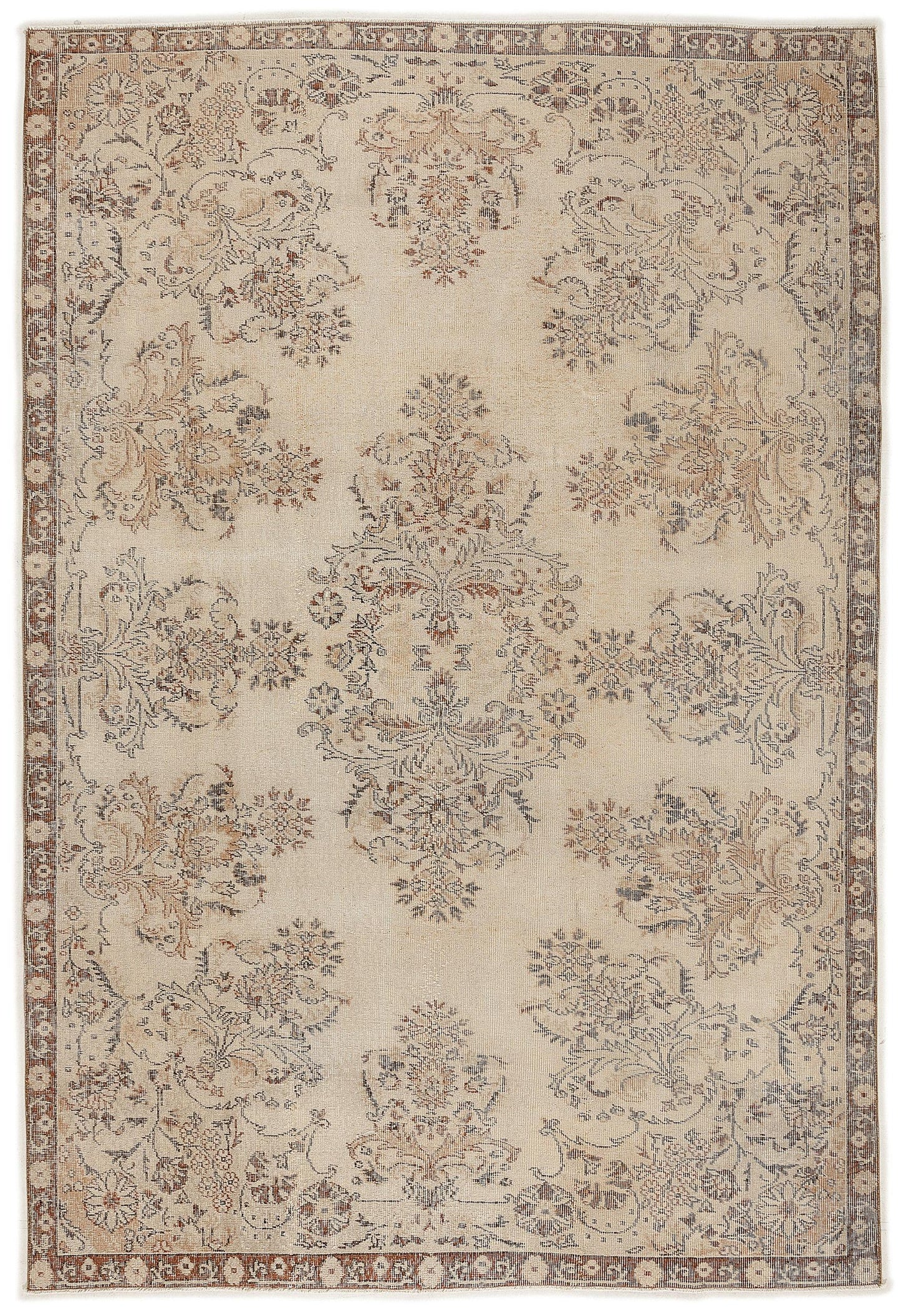 The Tefaas Vintage Floral Rug (6'8" x 9'7") features intricate beige floral and vine patterns in muted brown, gray, and cream tones with a delicate symmetrical border for an ornate vintage look.