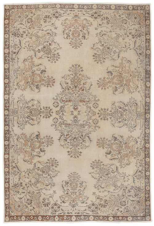 Load image 1 in gallery view. The Tefaas Vintage Floral Rug (6'8" x 9'7") features intricate beige floral and vine patterns in muted brown, gray, and cream tones with a delicate symmetrical border for an ornate vintage look.