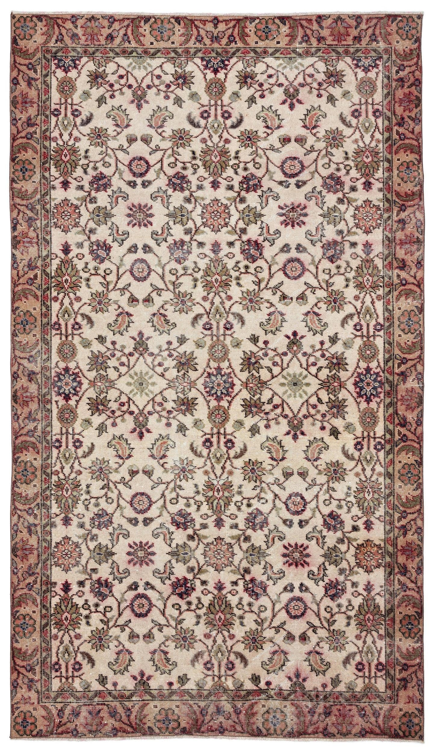 Beige traditional rug with a repeating floral vine pattern in muted red, green, and blue, featuring a decorative border.