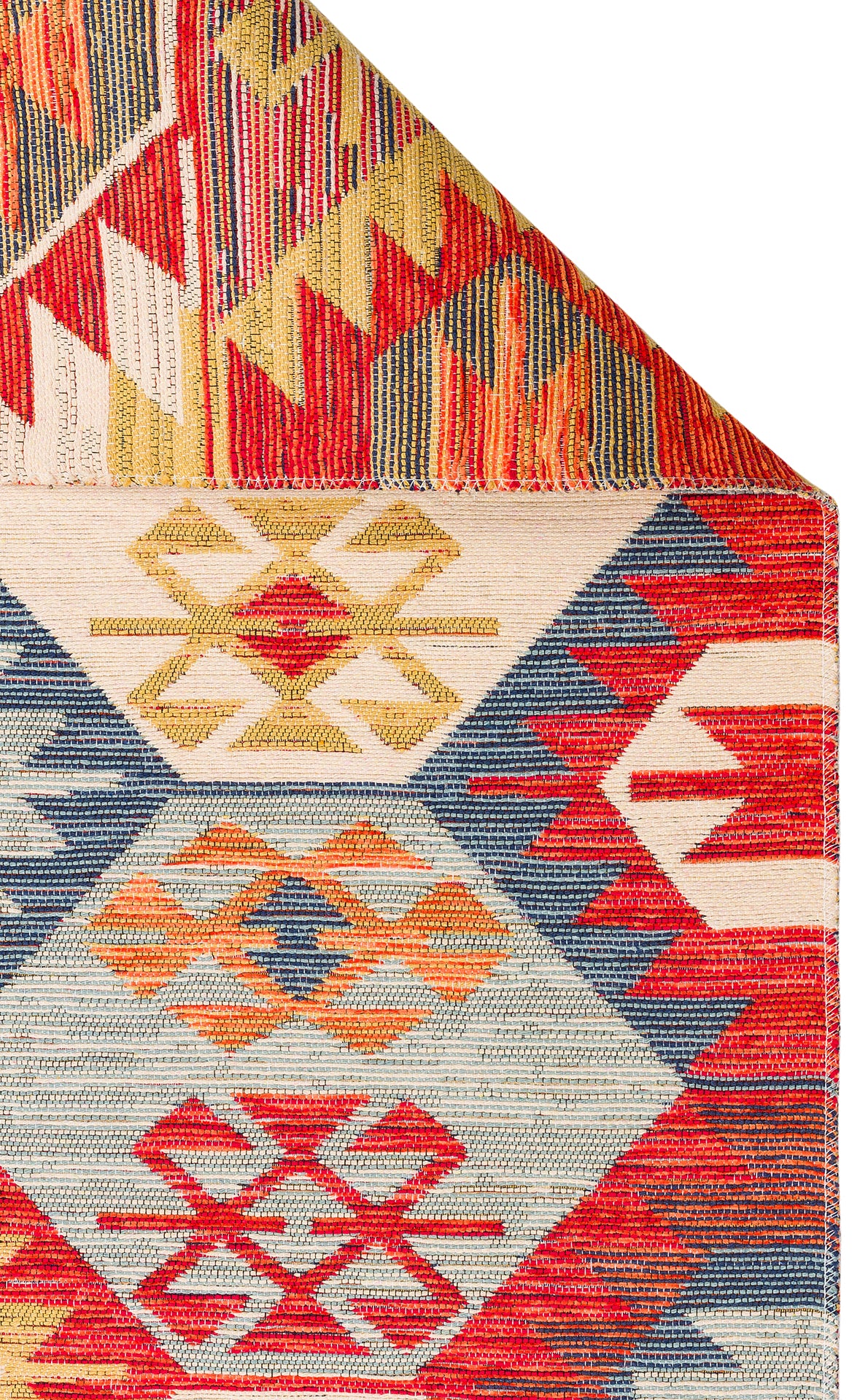 Ethnic Mix - Kilim - NMD01: A multicolour rug with geometric diamond and zigzag patterns in red, blue, yellow, and orange; one corner is folded to show vivid tribal motifs beneath.