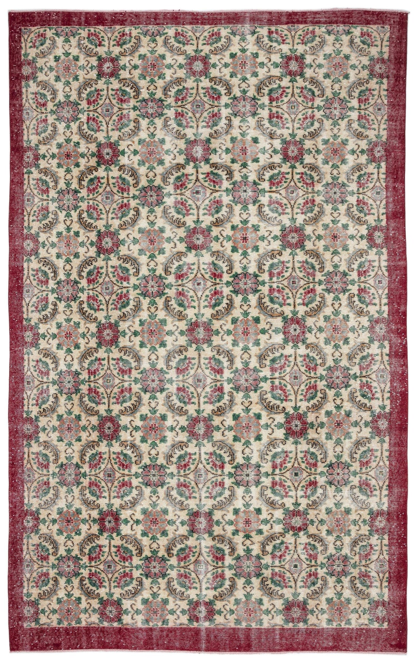 Beige rug with a red border and a repeating floral medallion pattern in red, green, and muted blue.