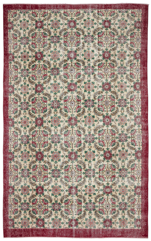Load image 1 in gallery view. Beige rug with a red border and a repeating floral medallion pattern in red, green, and muted blue.