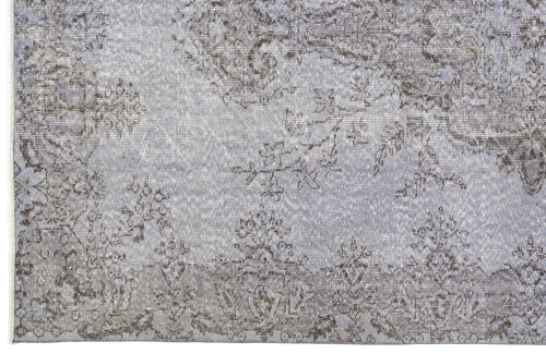Load image 1 in gallery view. Light blue and grey rug with a distressed, traditional floral medallion pattern.