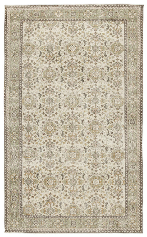 Load image 1 in gallery view. The Nizora Vintage Floral Rug (6'1" x 10'0) features an intricate, symmetrical floral and vine pattern in muted beige, cream, and sage green with decorative borders for a timeless, elegant look.
