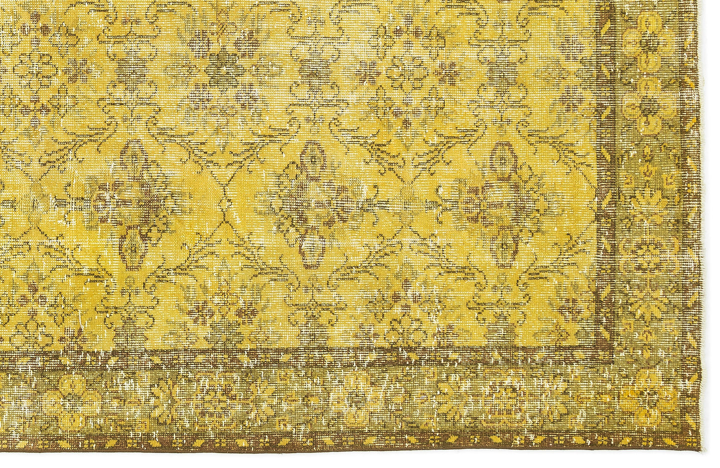Mustard yellow and brown distressed rug with a traditional floral medallion pattern and a decorative border.