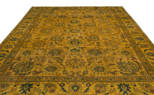 Load image 1 in gallery view. Mustard yellow vintage-style rug with a dark green and brown floral medallion pattern and a decorative border.