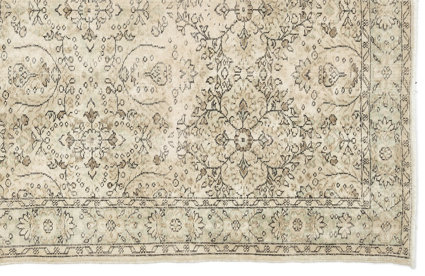 Beige and taupe vintage-style rug with a distressed floral medallion pattern and a decorative border.