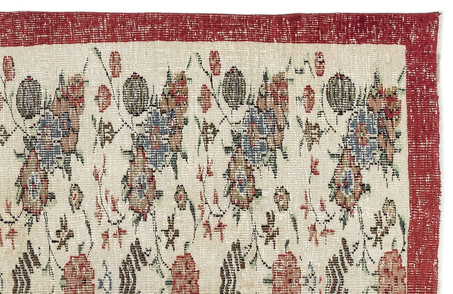 Cream rug with a distressed red border and a repeating floral pattern in muted red, blue, and green tones.
