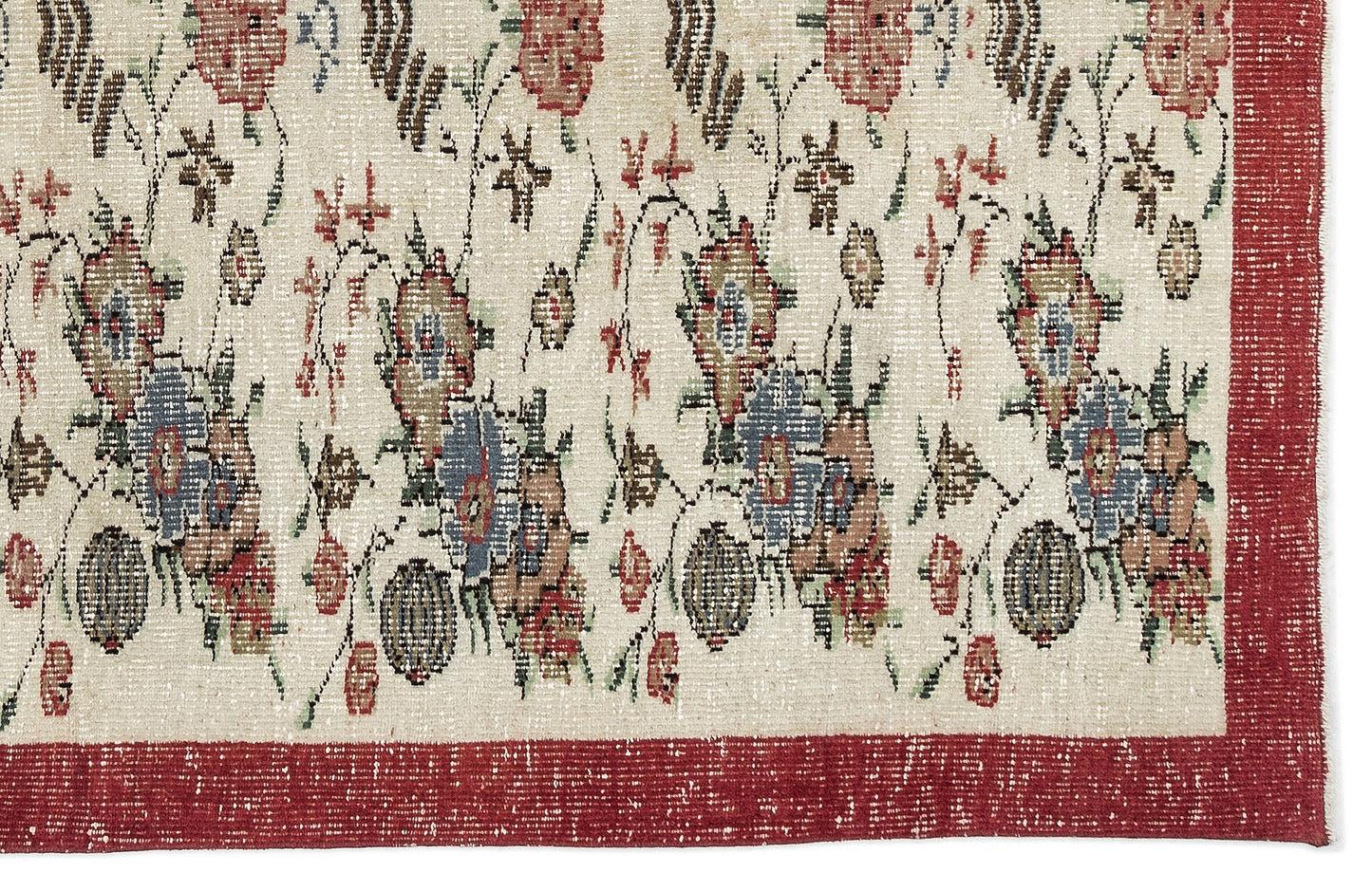 Cream rug with a distressed floral pattern in red, blue, and brown, featuring a solid red border.