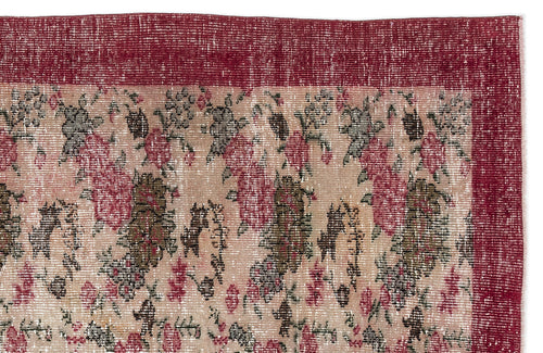 Load image 1 in gallery view. Distressed floral rug in shades of deep red, muted pink, and olive green with a solid red border.