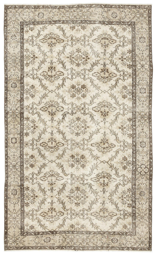 Load image 1 in gallery view. Beige and brown rug with a traditional floral medallion pattern and a decorative border on a white background.