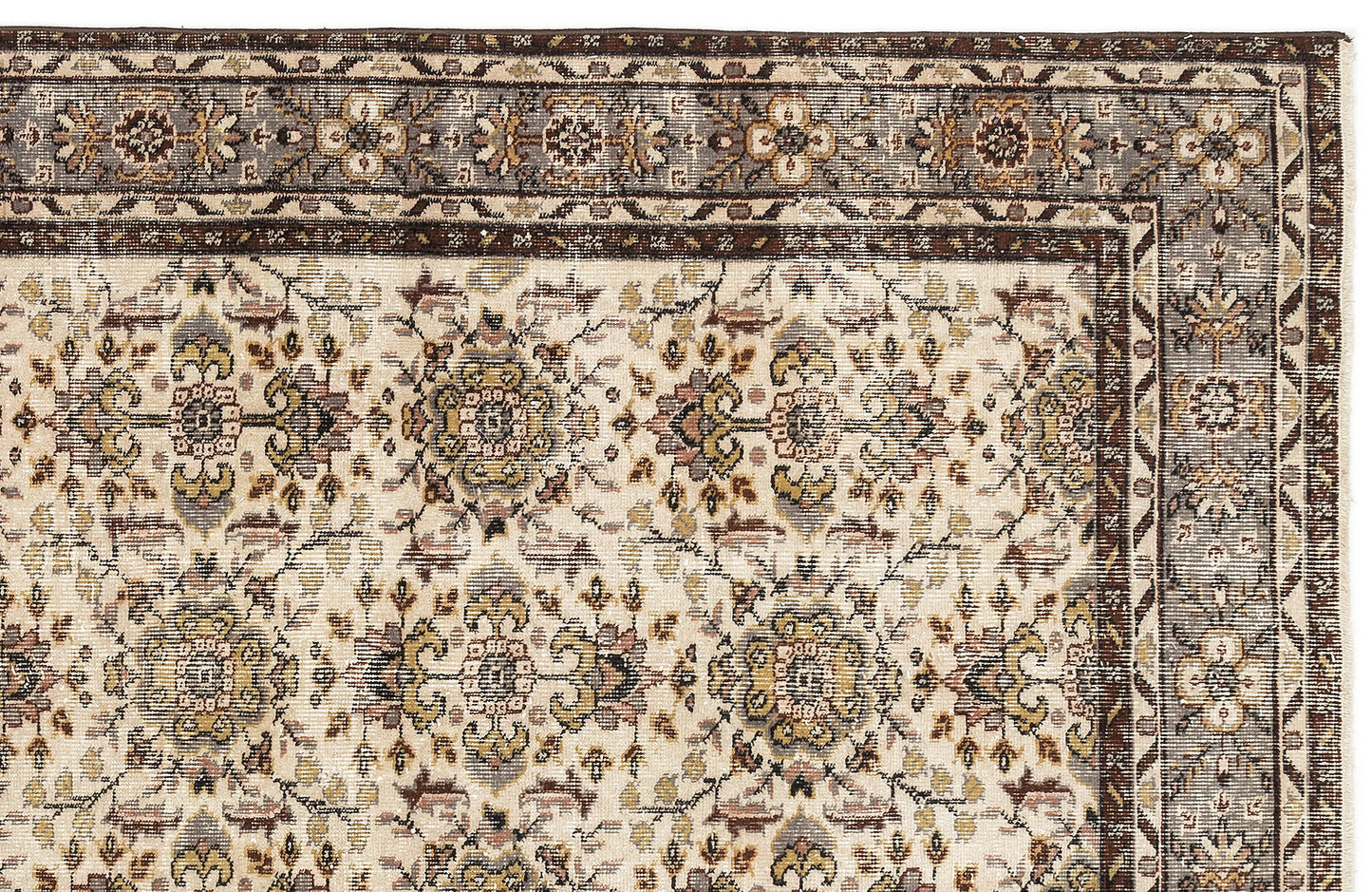 Cream rug with a traditional floral medallion pattern in brown, grey, and muted gold, featuring a detailed border.