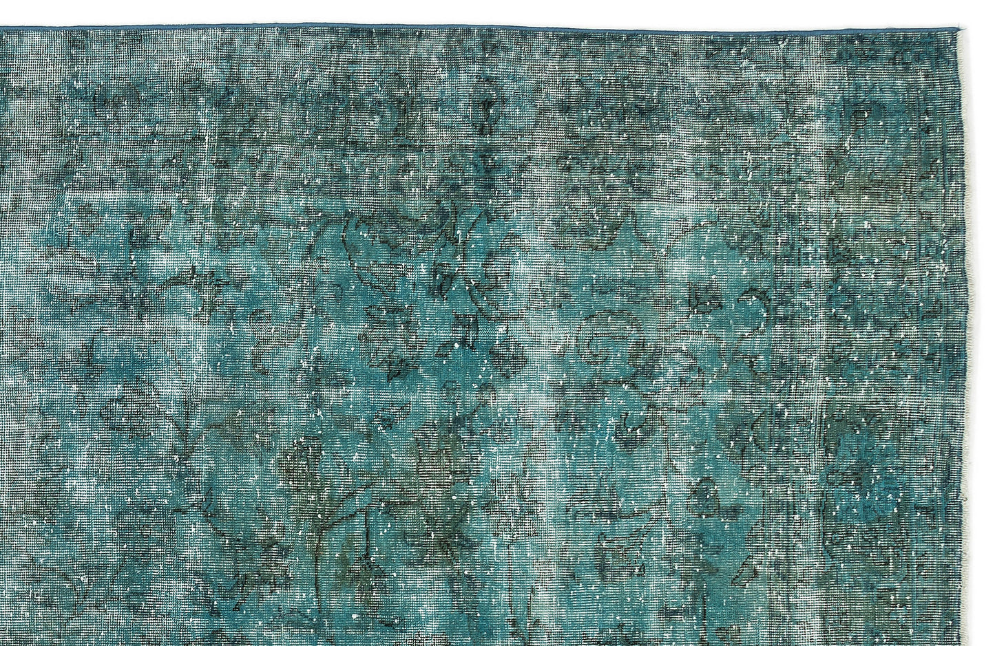 Teal and dark blue distressed rug with a faded, intricate floral medallion pattern on a white background.