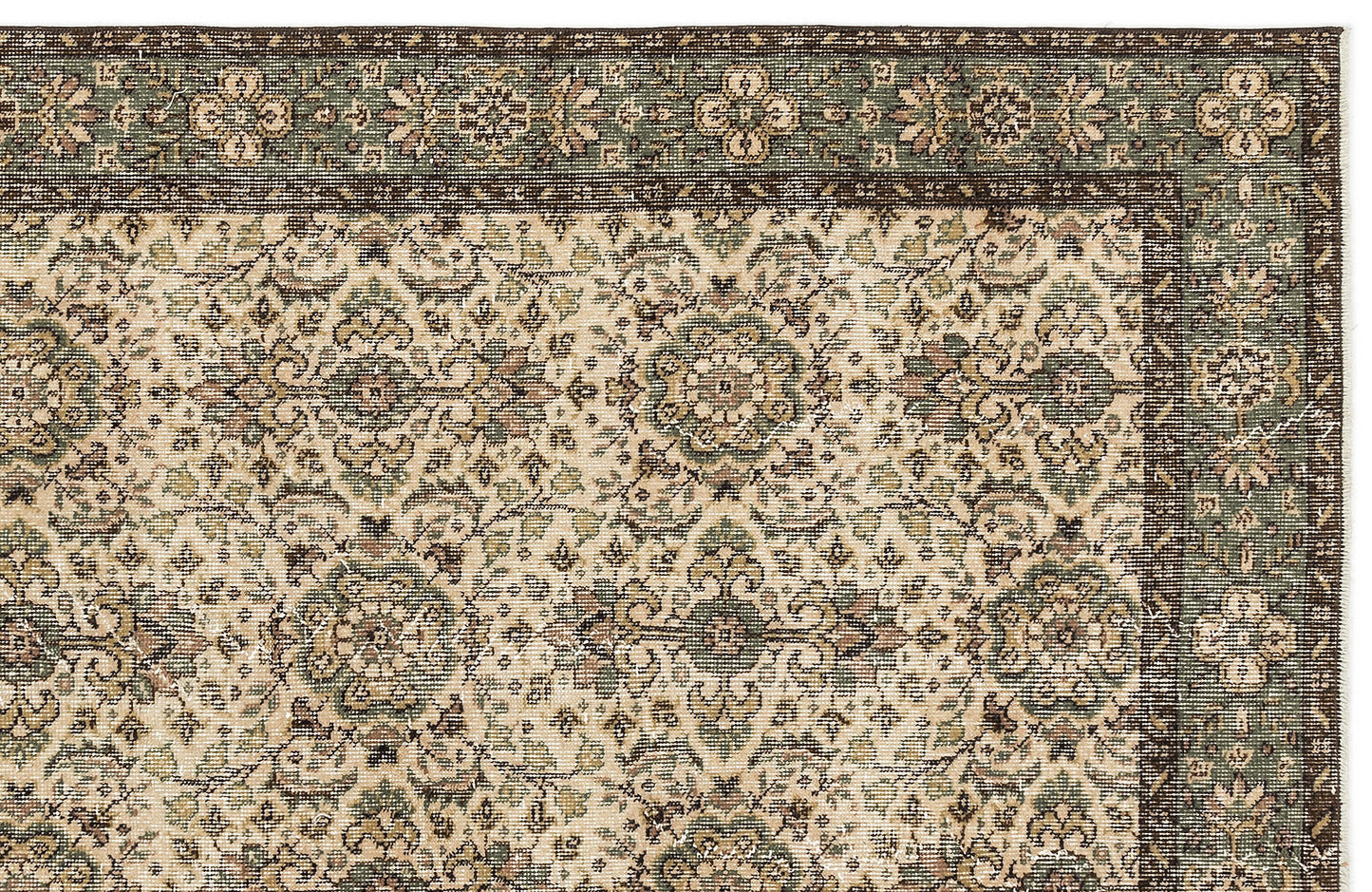 Sage green, brown, and cream traditional rug with a repeating floral medallion pattern and a wide decorative border.