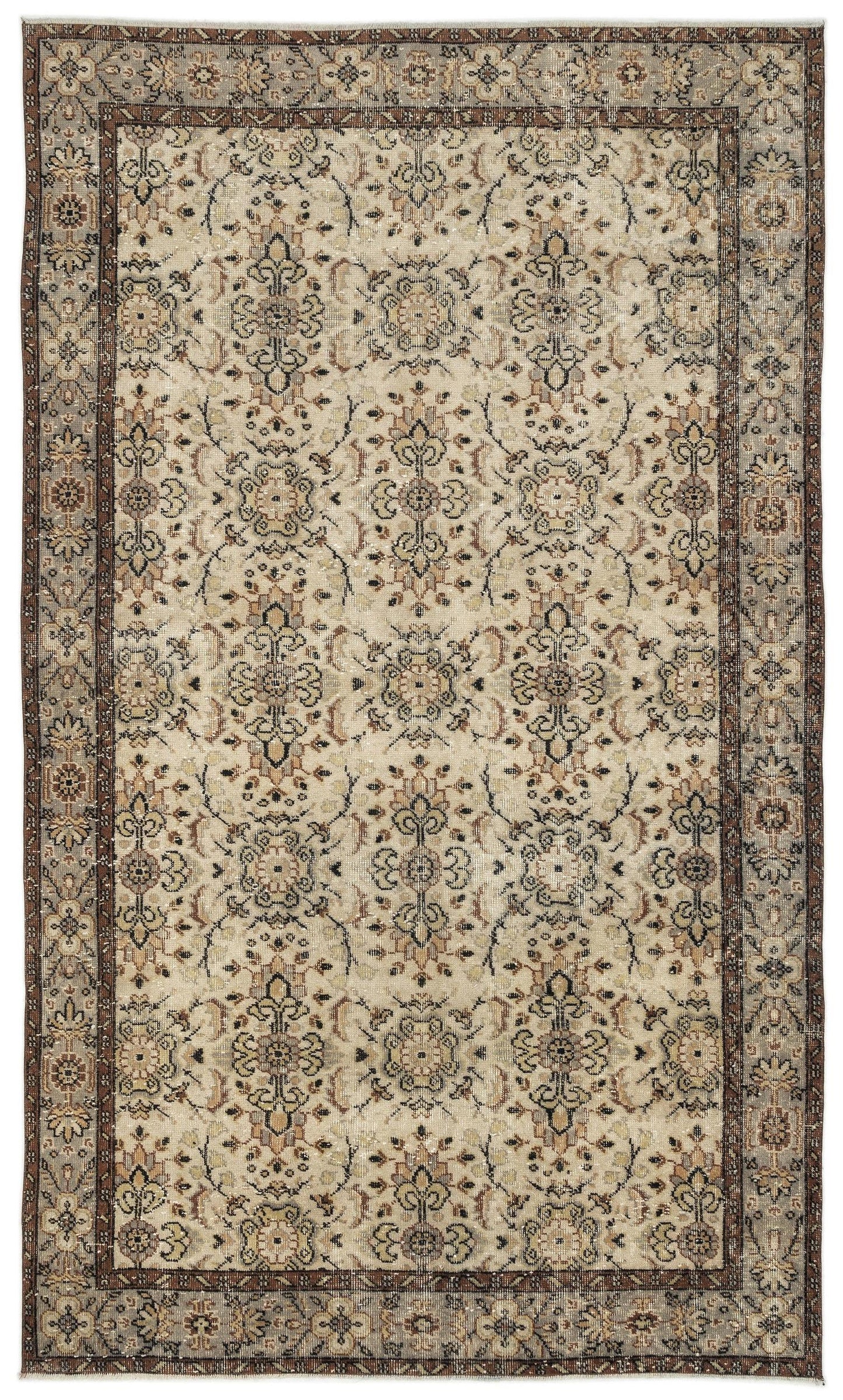 Beige and brown traditional rug with a repeating floral medallion pattern and a decorative border.