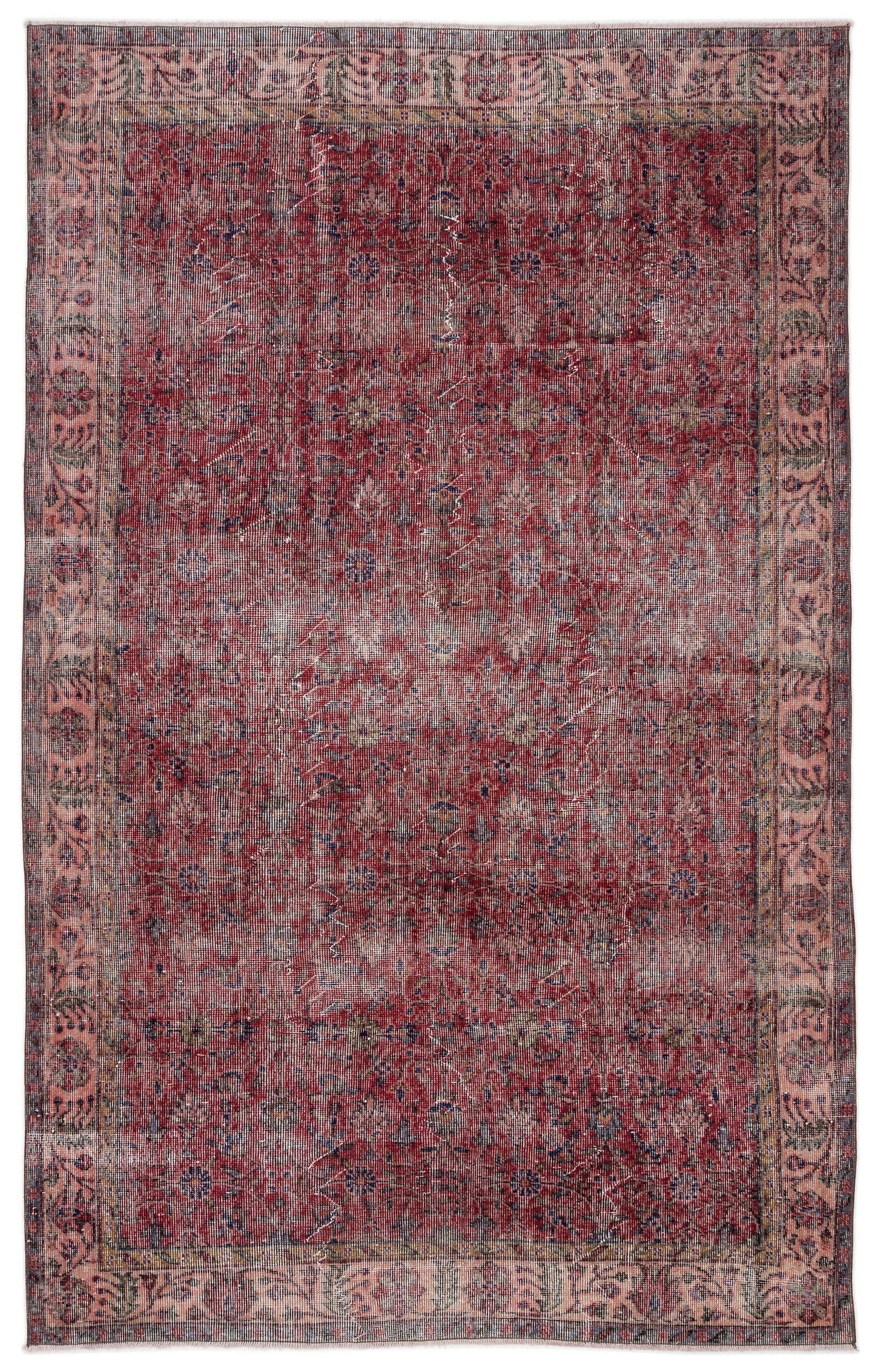 Distressed red and muted blue traditional rug with a central floral medallion and ornate border on a white background.