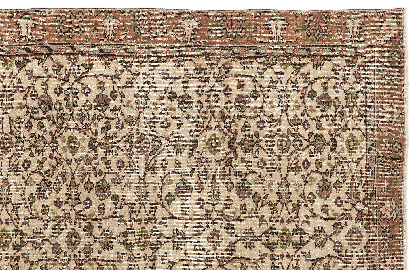 Beige traditional rug with a distressed floral vine pattern in muted terracotta, sage green, and navy blue.