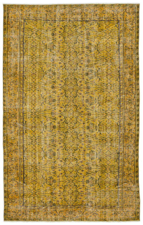 Load image 1 in gallery view. Mustard yellow distressed rug with a dark grey intricate floral trellis pattern and a bordered edge.