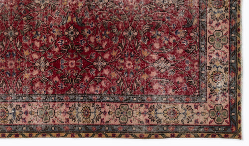 Load image 1 in gallery view. Deep red traditional rug with a distressed floral pattern and a beige border featuring intricate geometric motifs.