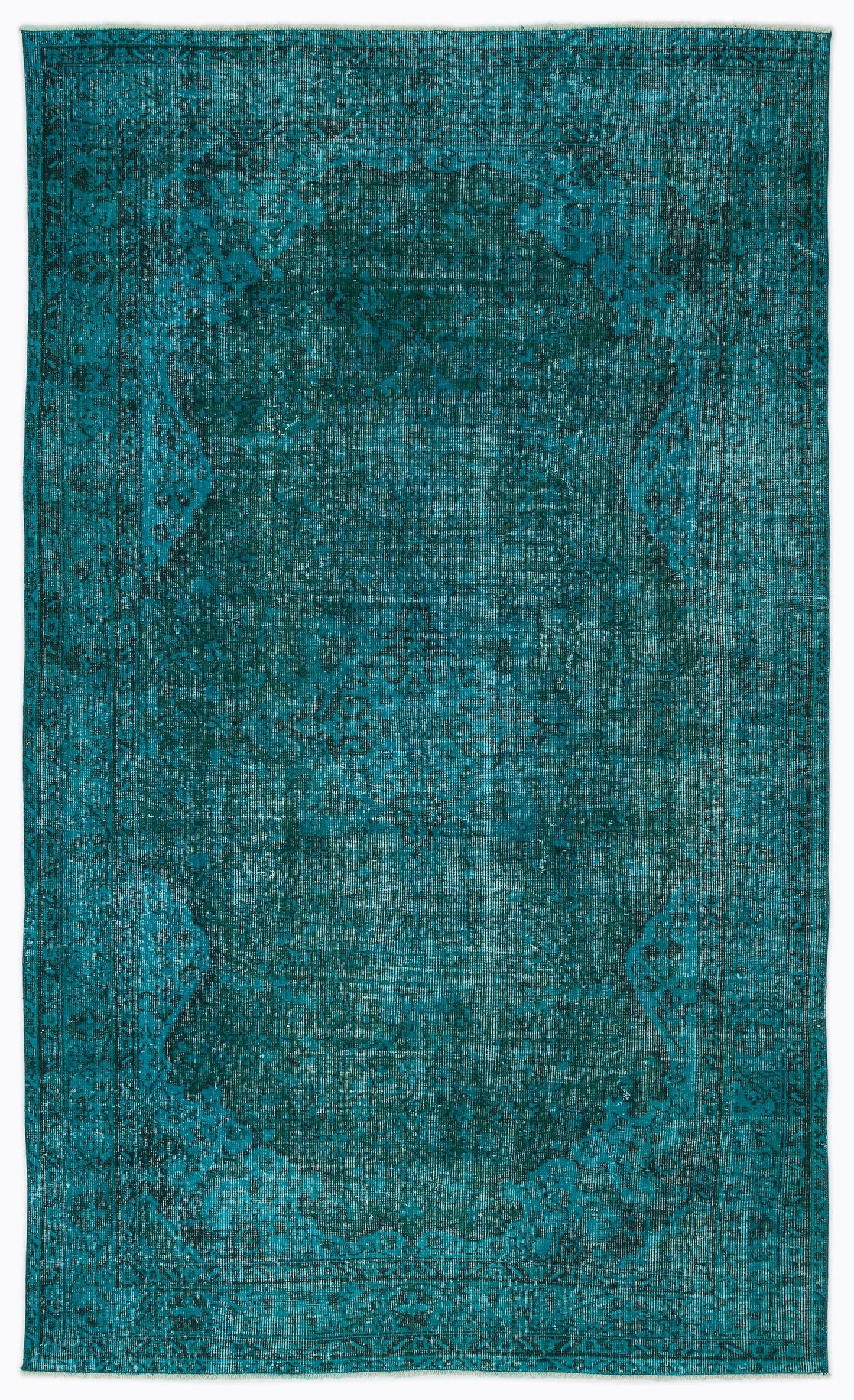Teal distressed area rug with a traditional central medallion and ornate border pattern.