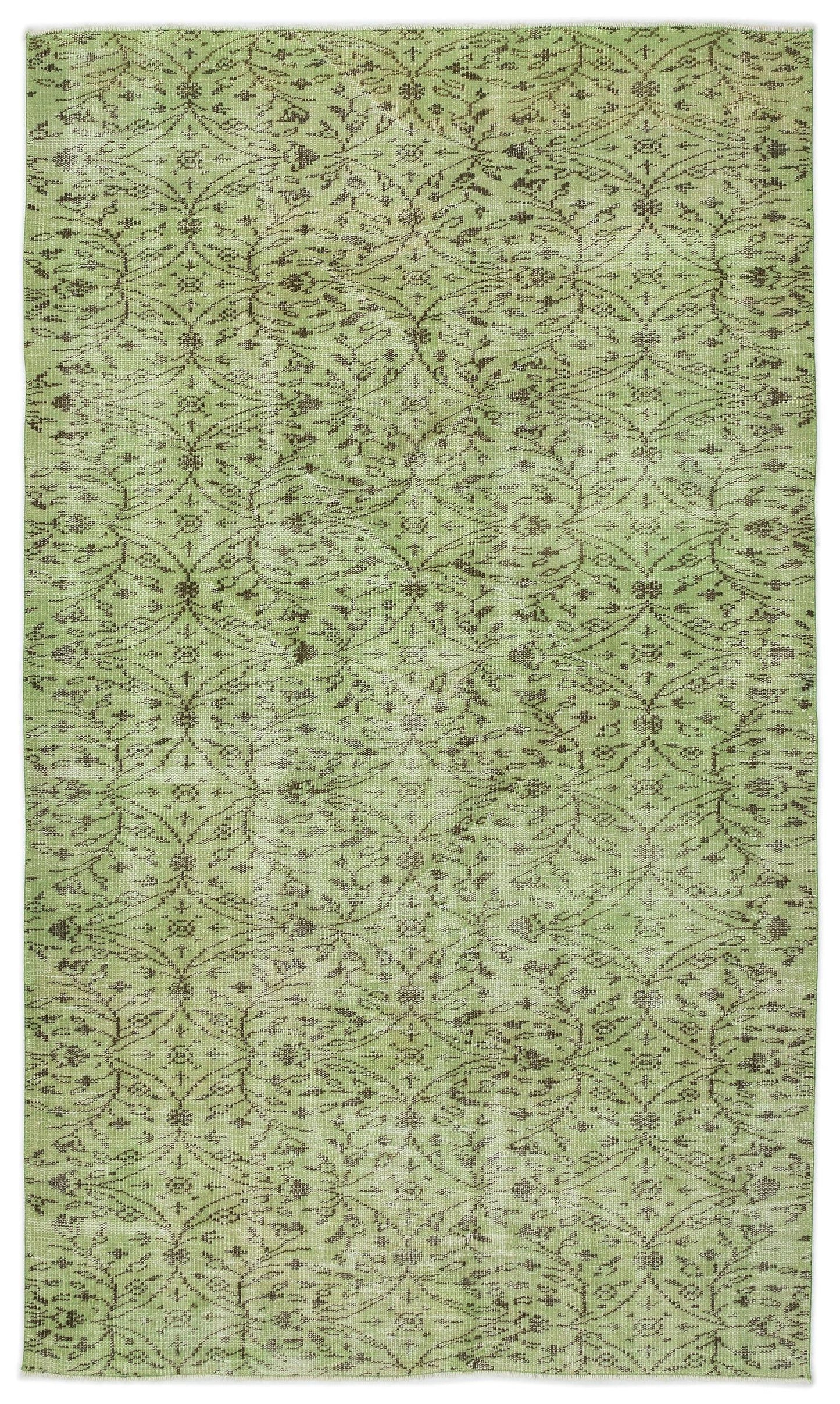 Sage green distressed rug with a dark brown repeating floral trellis pattern.