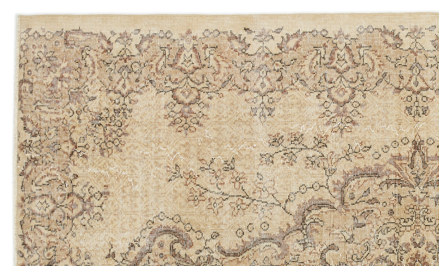 Beige and brown vintage-style rug with a distressed floral medallion pattern on a white background.