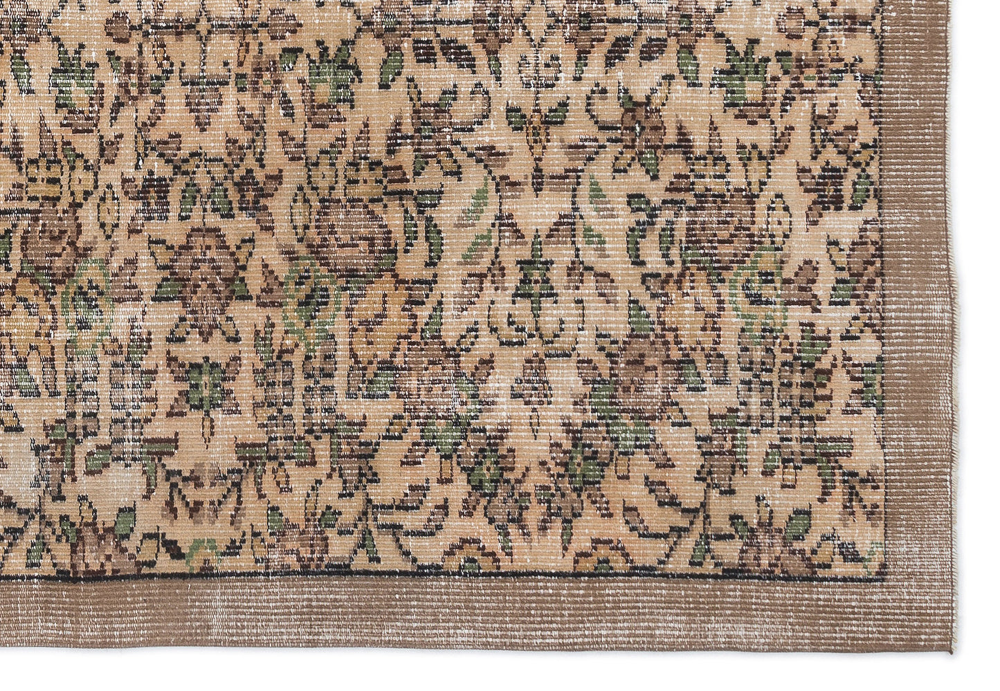 Tan and brown rug with a distressed floral pattern, green accents, and a solid border on a white background.