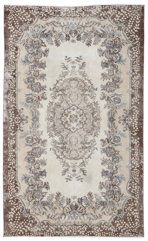Load image 1 in gallery view. Cream, brown, and blue traditional rug with a central floral medallion and ornate border on a white background.