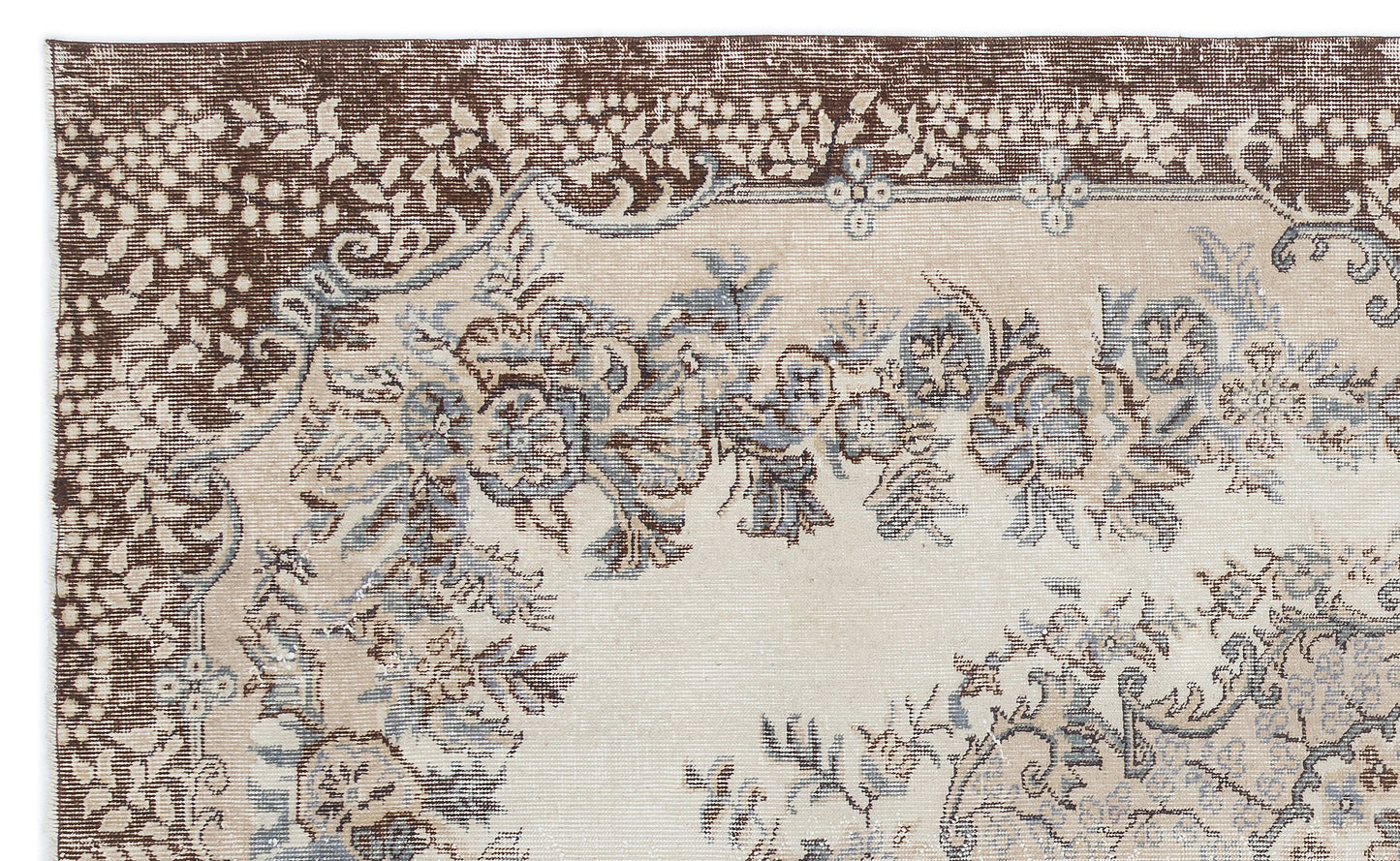 Beige, brown, and slate blue traditional rug with a floral medallion pattern and a wide decorative border.