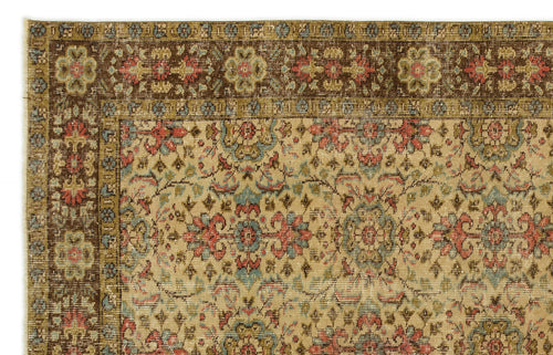 Load image 1 in gallery view. Beige traditional rug with a dark brown border and intricate floral medallion pattern in red, blue, and olive green.