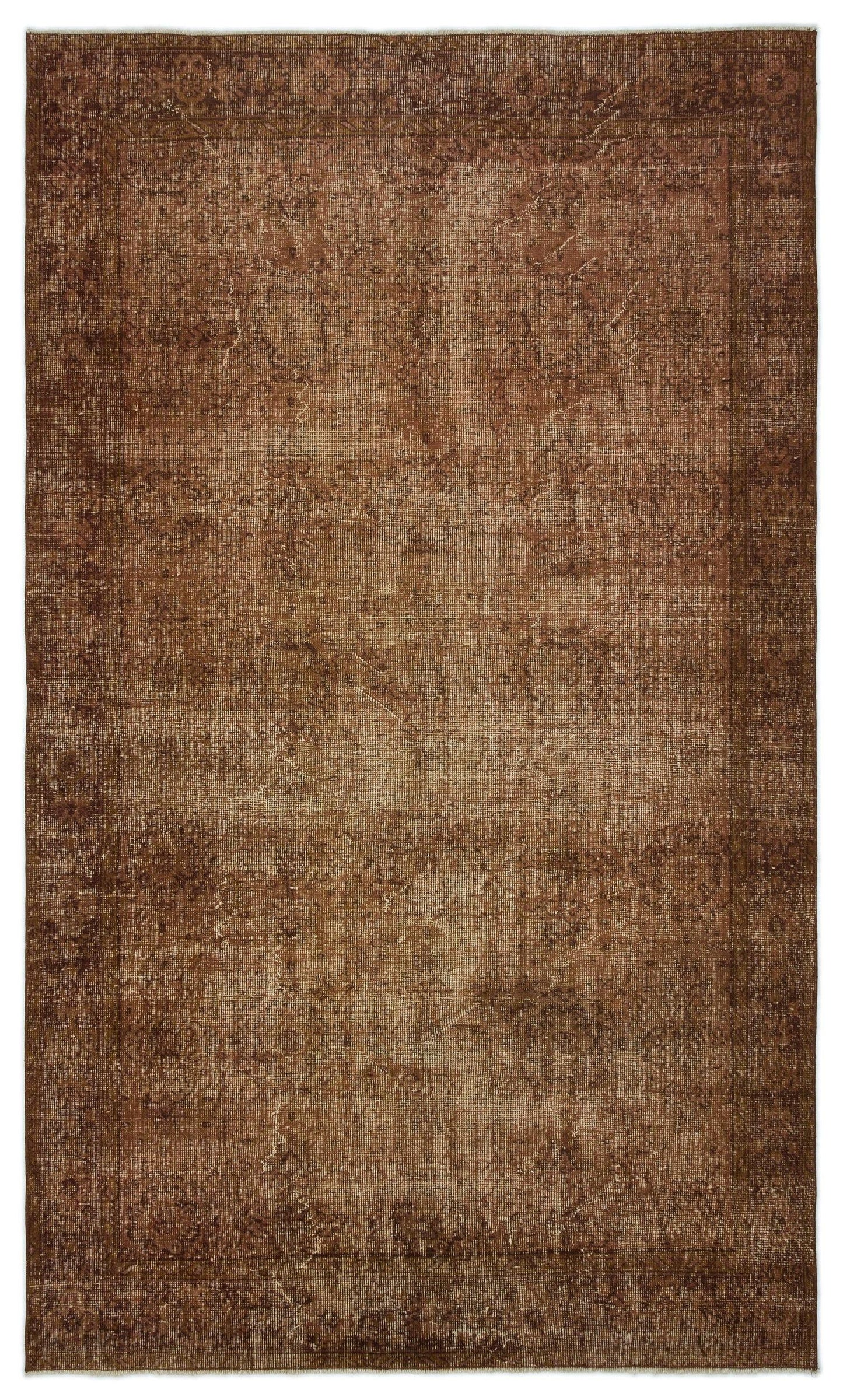 Dark brown distressed traditional rug with a faded central medallion and ornate border.