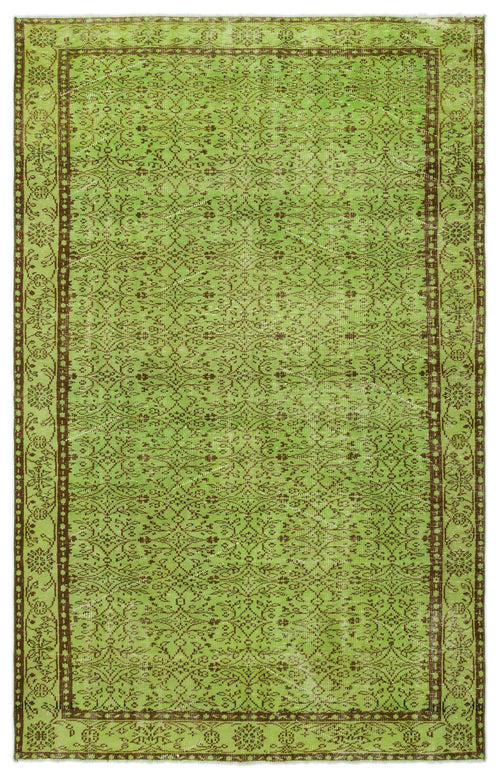Load image 1 in gallery view. Lime green and brown vintage-style rug with an intricate floral medallion pattern and a decorative border.