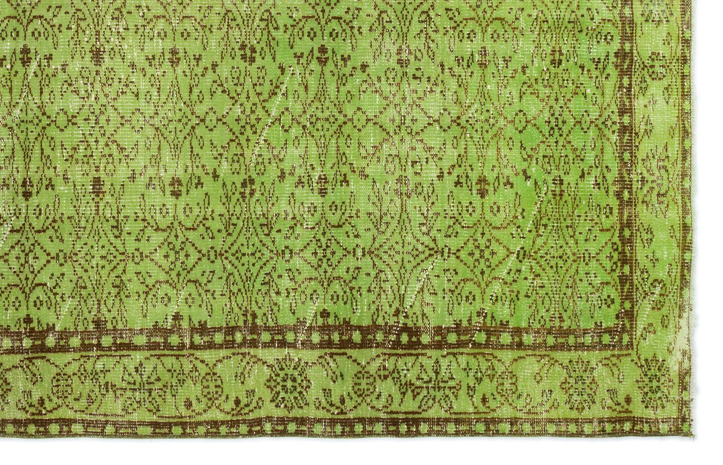 Bright green rug with a distressed brown floral damask pattern and a decorative border.
