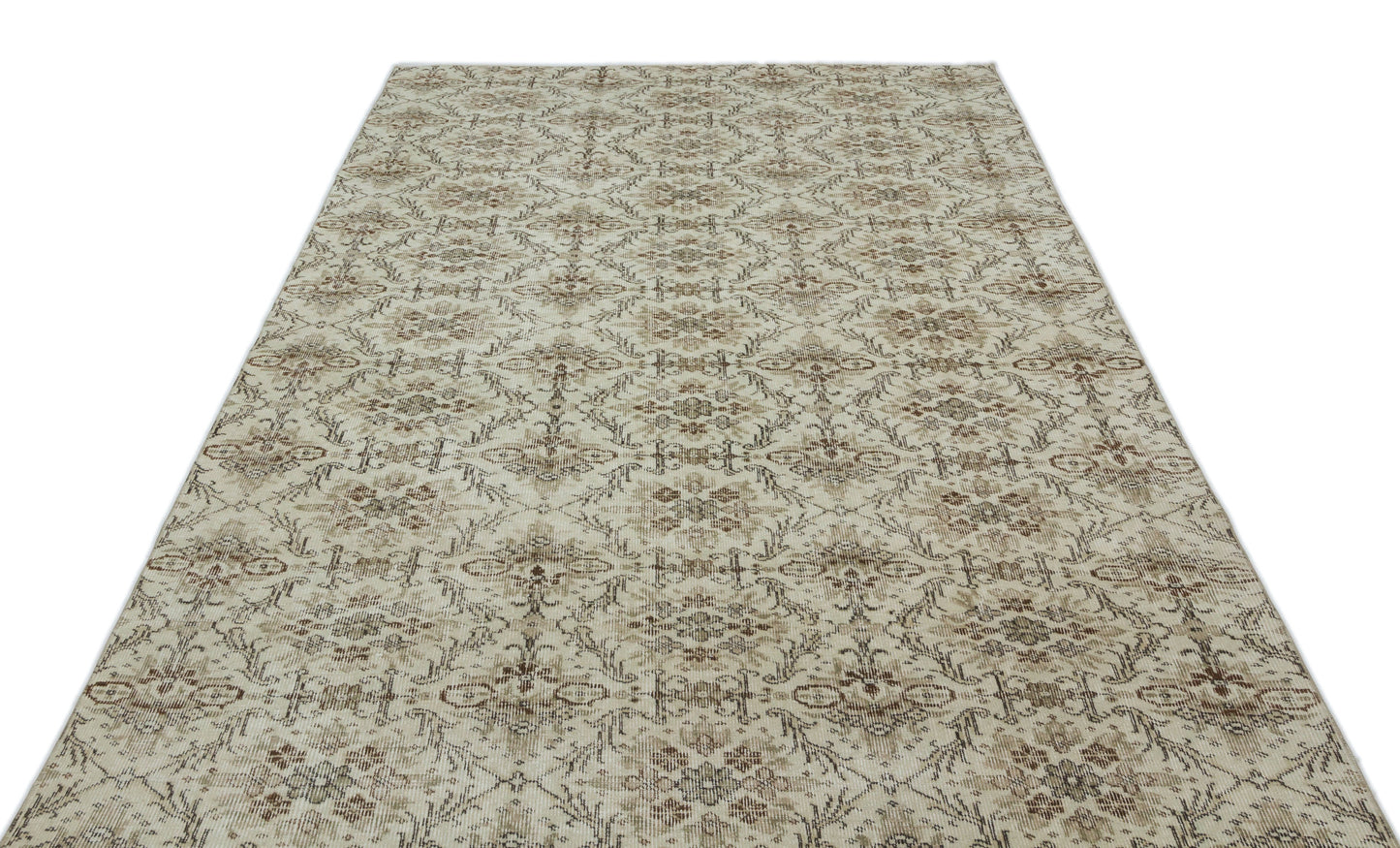 Beige and brown vintage-style rug with a repeating floral medallion pattern on a white background.