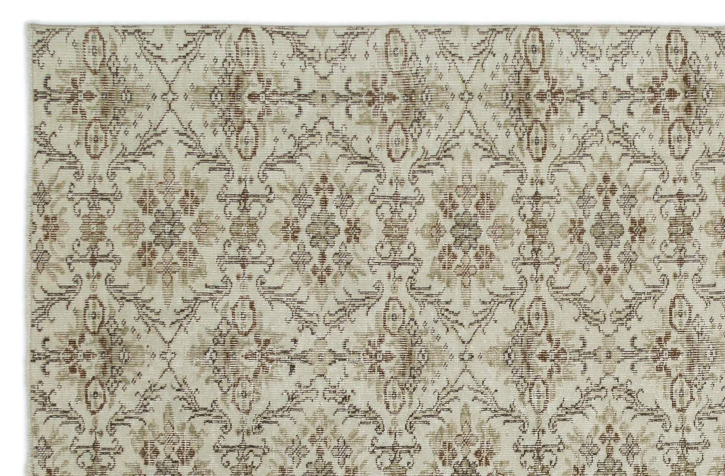 Beige and brown rug with a repeating distressed floral medallion pattern on a white background.