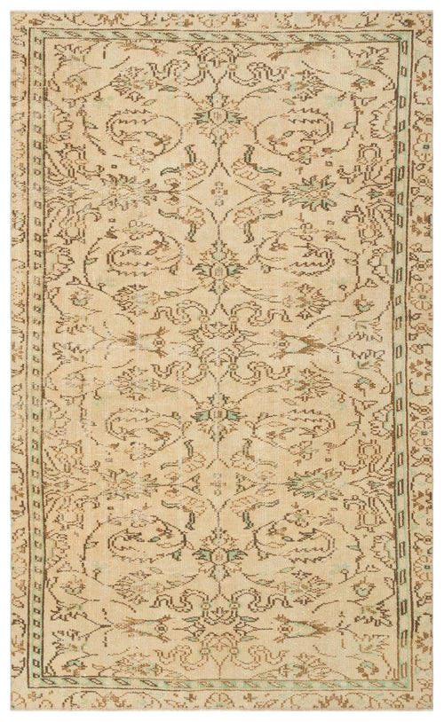 Load image 1 in gallery view. Beige vintage-style rug with a distressed floral medallion pattern in brown and sage green accents.