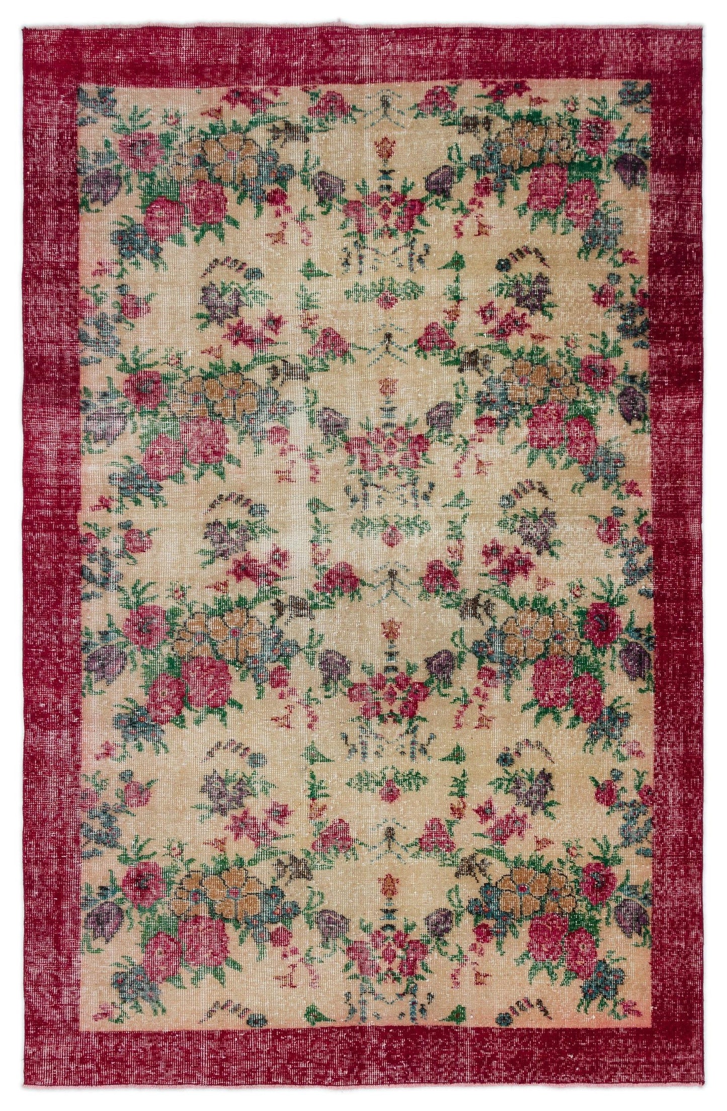 Beige vintage-style rug with a red border and a distressed floral pattern in red, green, and purple.