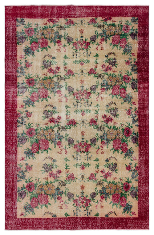 Load image 1 in gallery view. Beige vintage-style rug with a red border and a distressed floral pattern in red, green, and purple.