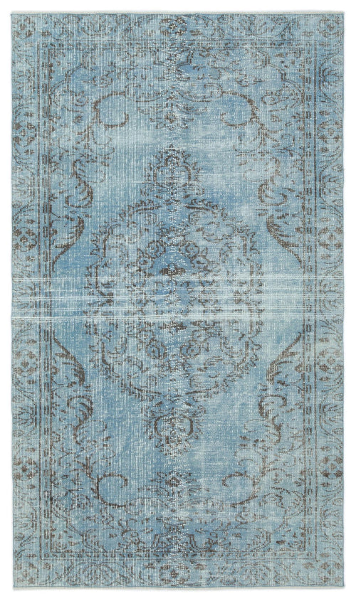 Load image 1 in gallery view. Light blue and grey distressed rug with a traditional central medallion and ornate border pattern.