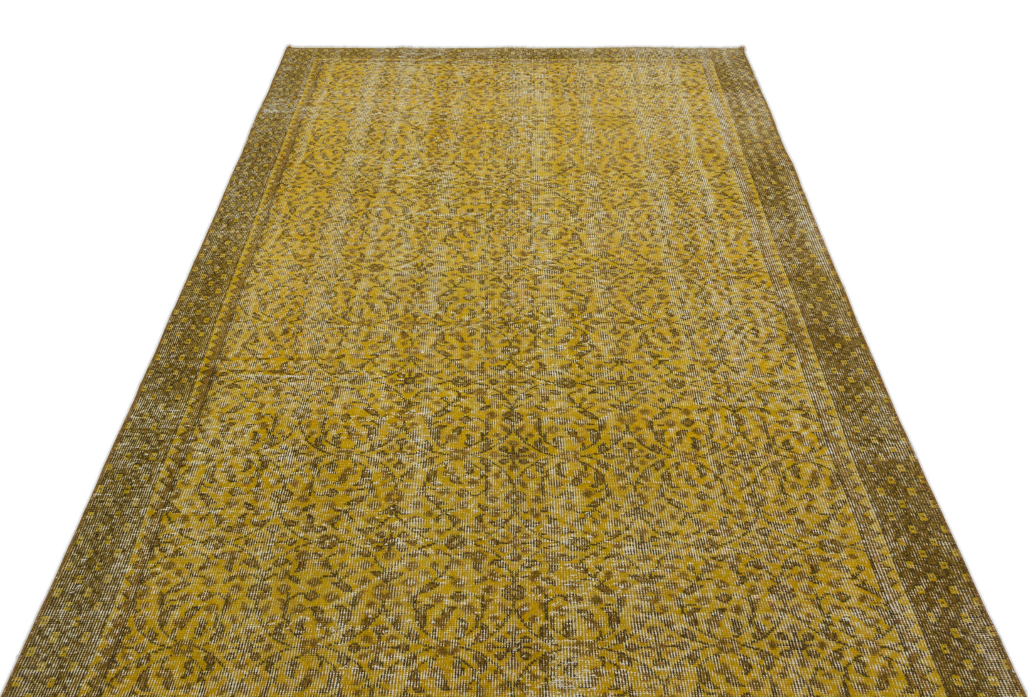 Mustard yellow and brown vintage-style rug with an intricate floral medallion pattern and a wide decorative border.