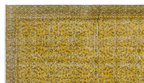 Load image 1 in gallery view. Mustard yellow and brown distressed rug with a traditional floral medallion pattern and a geometric border.