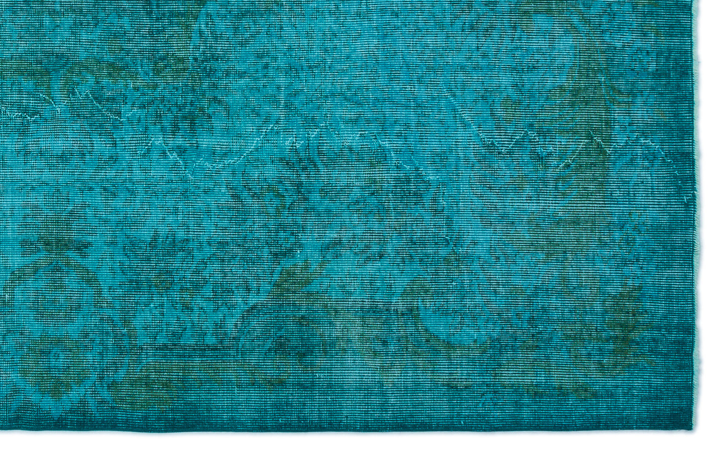 Teal and dark green rug with a distressed, faded traditional floral medallion pattern.