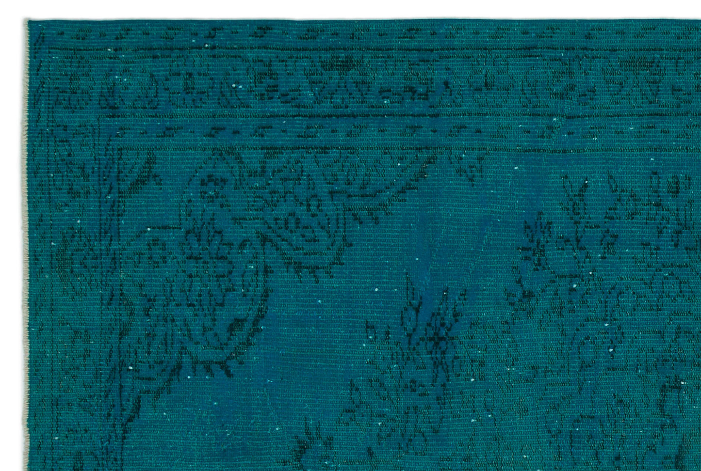Teal rug with a dark, distressed traditional floral medallion pattern and a bordered edge.