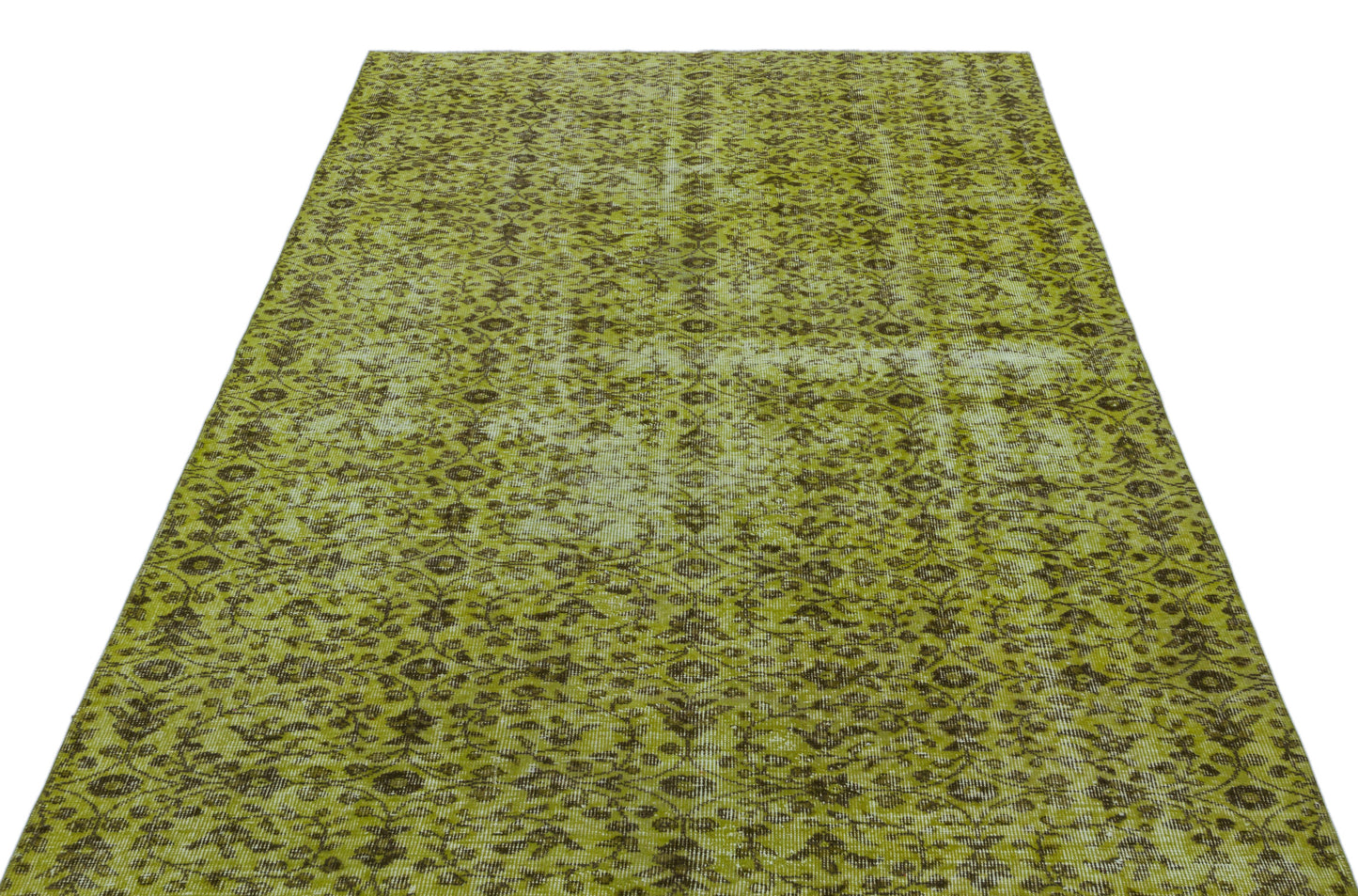 Chartreuse and dark brown distressed rug with an all-over traditional floral pattern.