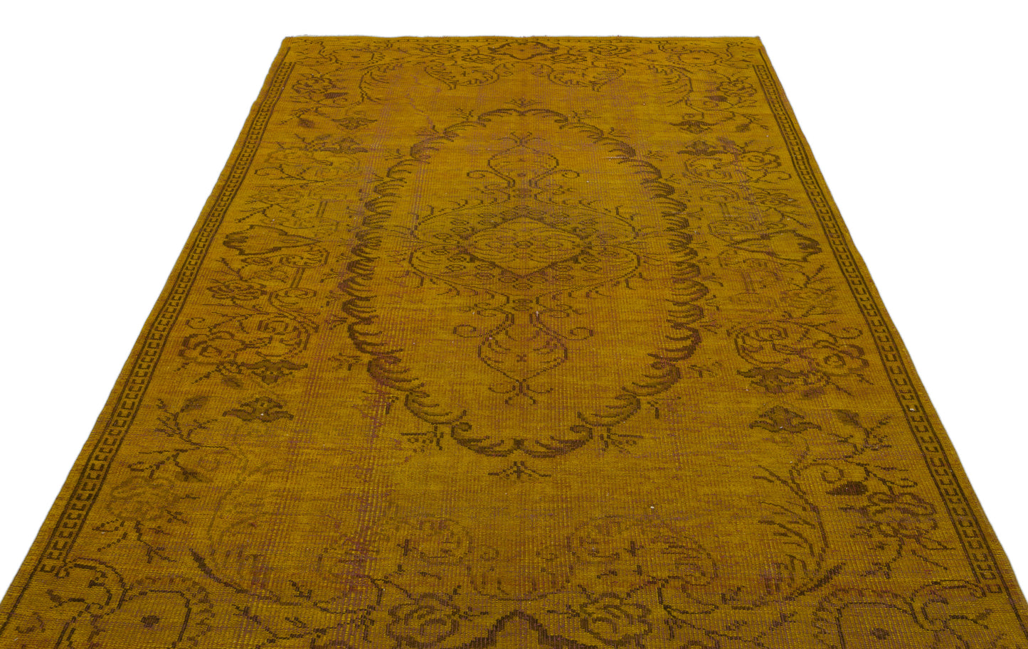 Mustard yellow vintage-style rug with a dark brown central floral medallion and ornate border on a white background.