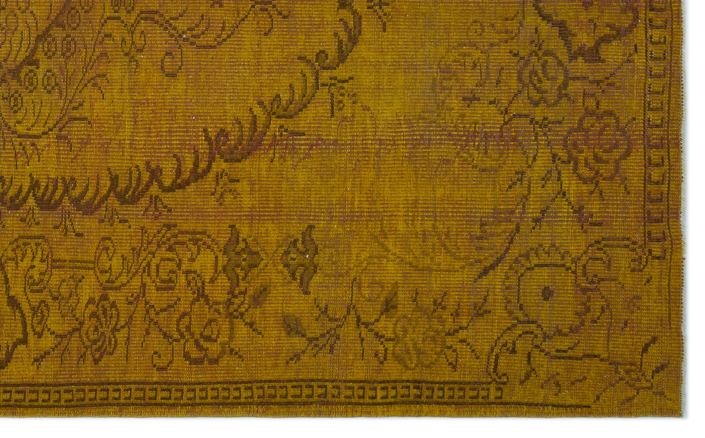 Mustard yellow vintage-style rug with a dark brown floral medallion pattern and a geometric border.