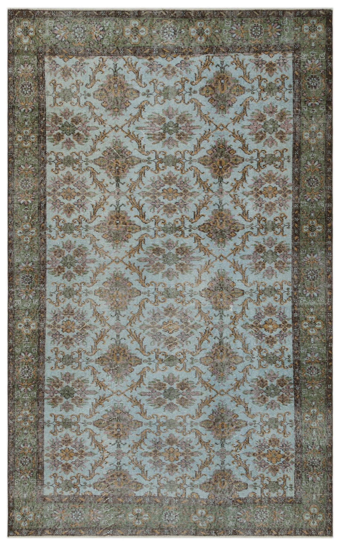 Light blue traditional rug with a distressed floral medallion pattern and a dark green and brown border.