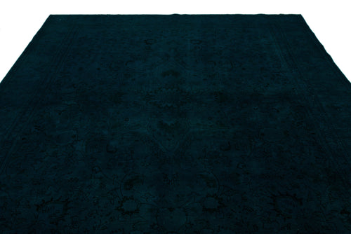 Load image 1 in gallery view. Dark teal monochromatic rug with a subtle, tone-on-tone traditional floral medallion pattern.