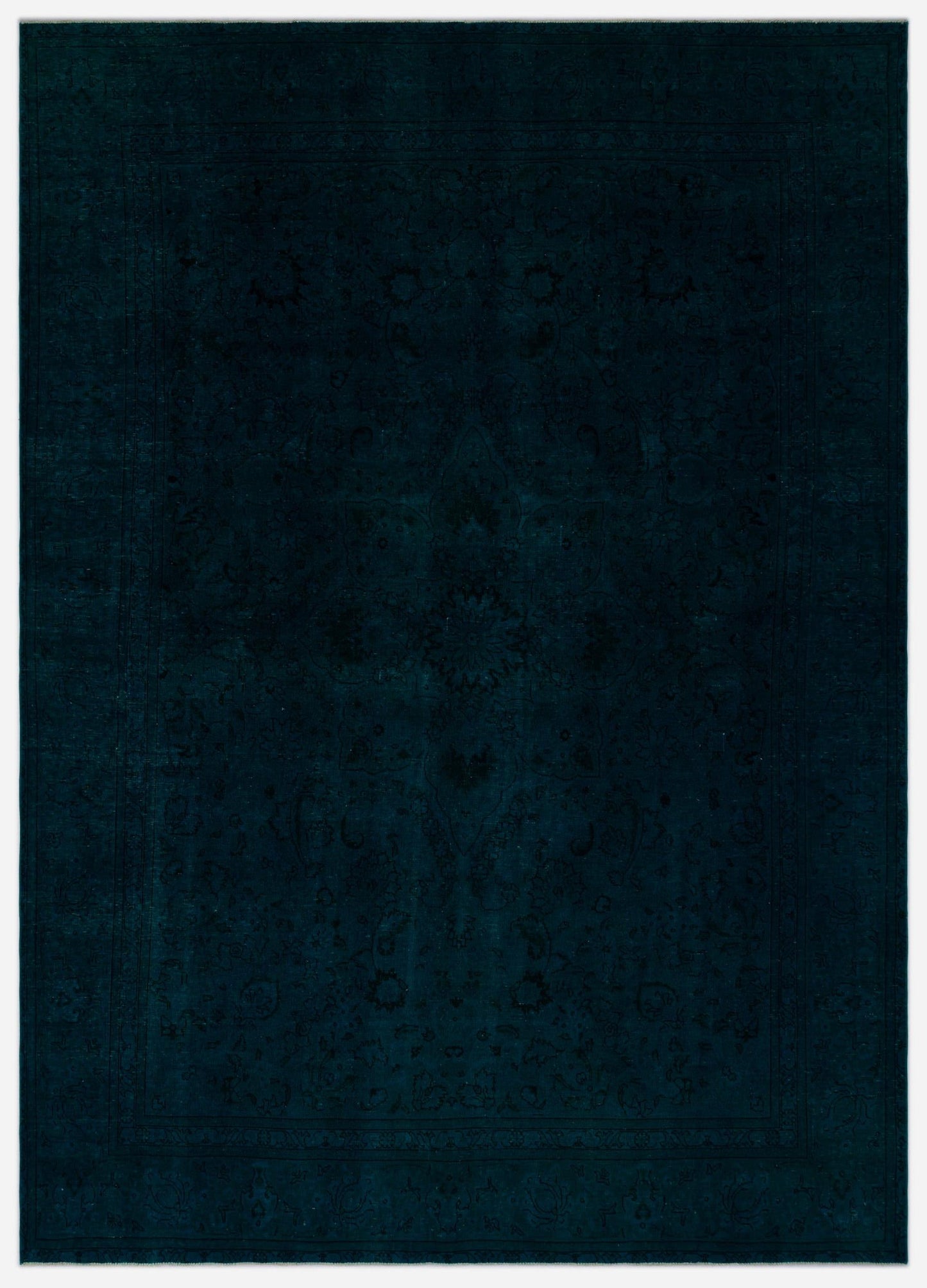 Dark navy monochromatic rug with a subtle, tone-on-tone traditional floral medallion pattern and a decorative border.